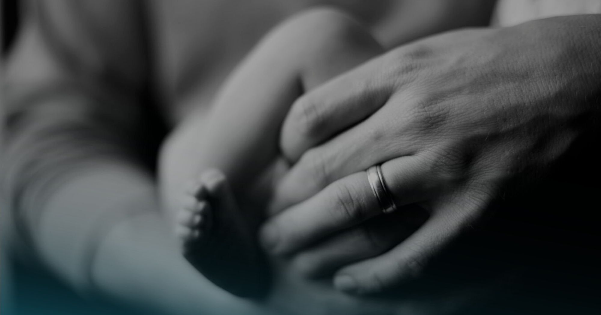 person holding baby